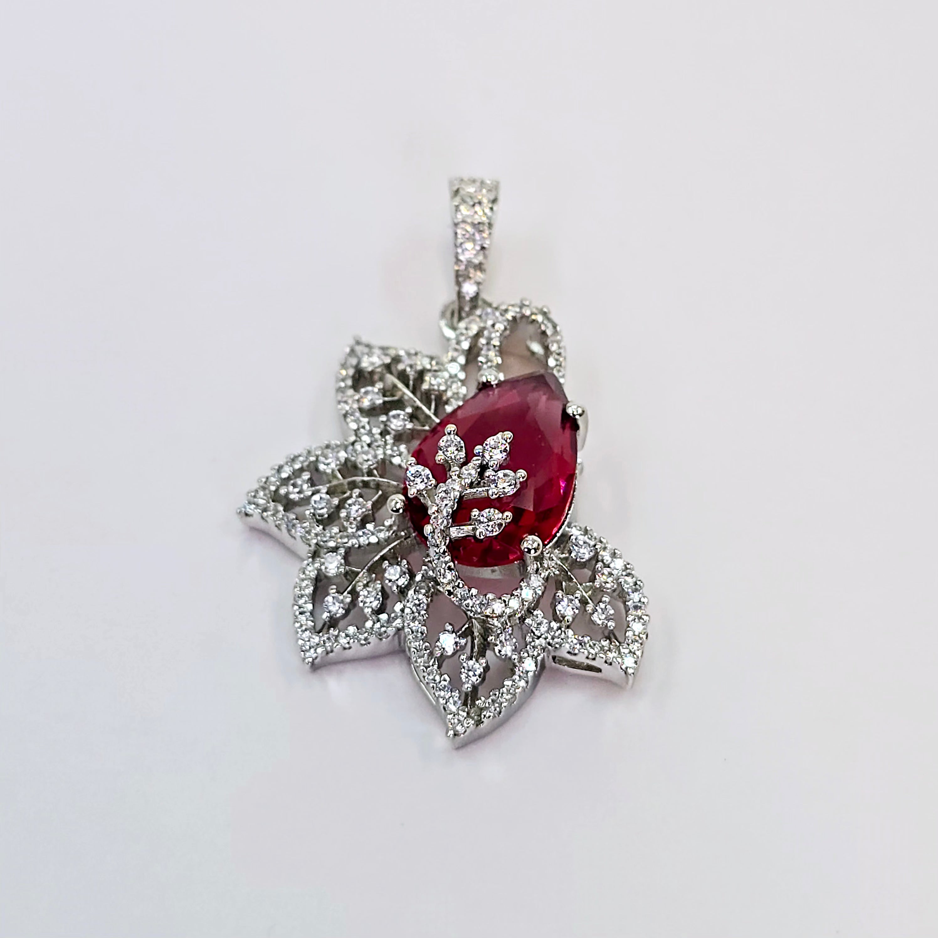 The Damia Whitegold A.D Pendant Earring