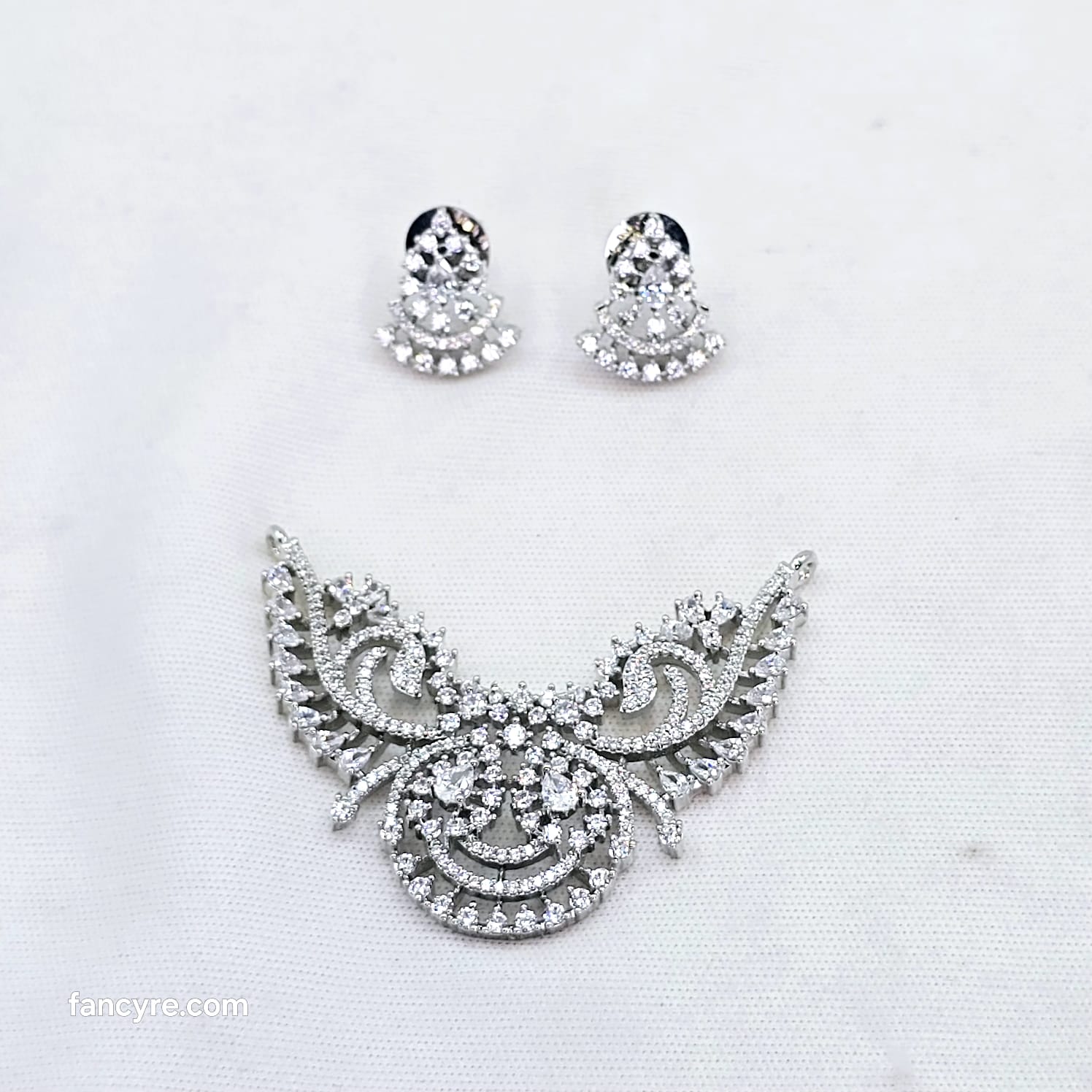 The Rehi Whitegold A.D Pendant Earring (M.S)