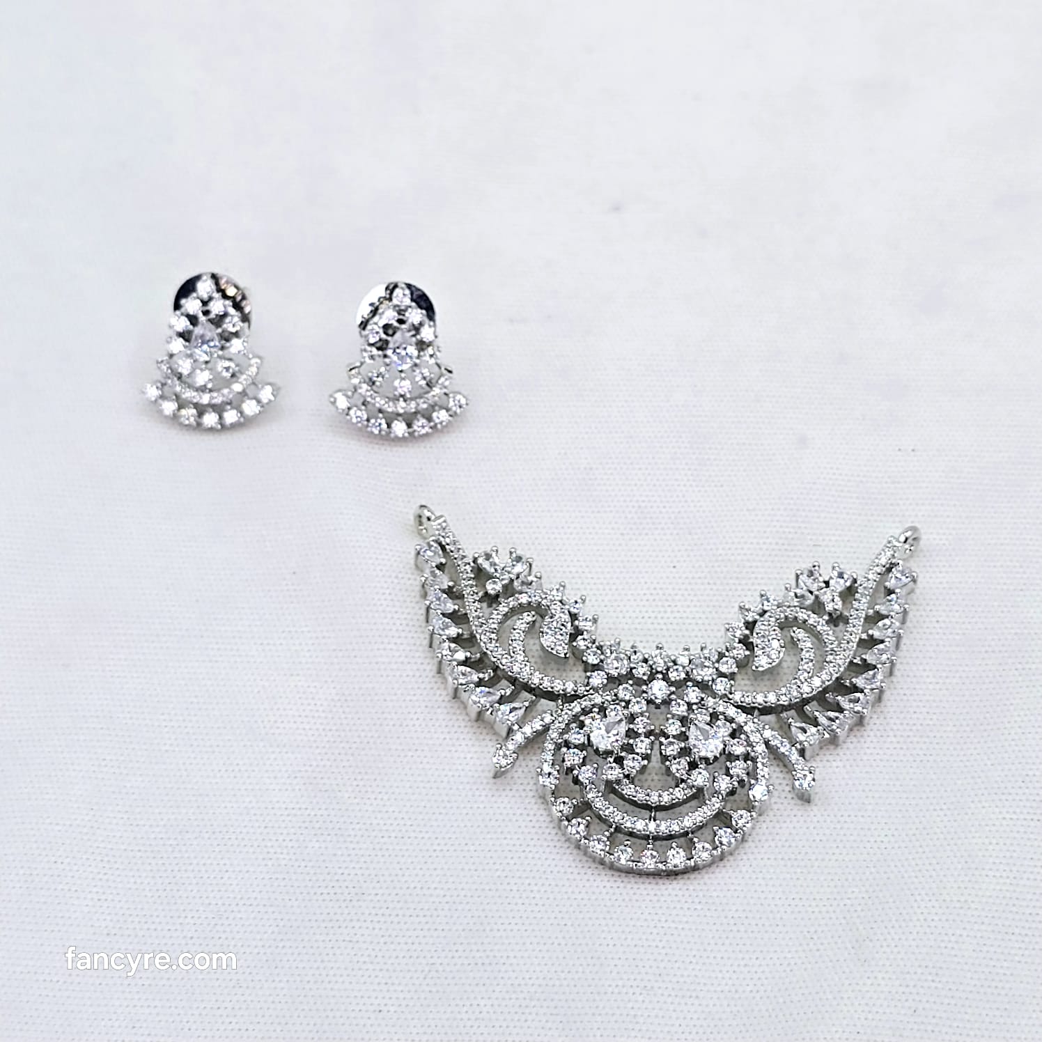 The Rehi Whitegold A.D Pendant Earring (M.S)