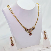 The Agraja Kempu Pendant Earring Set