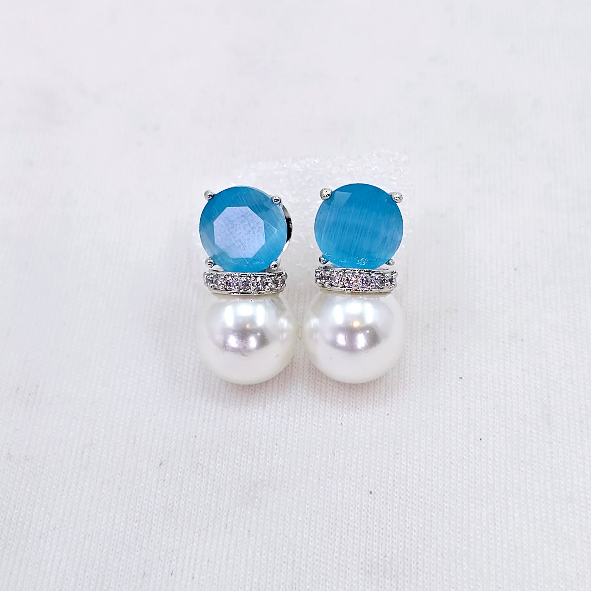 The Nitima Whitegold A.D Earring