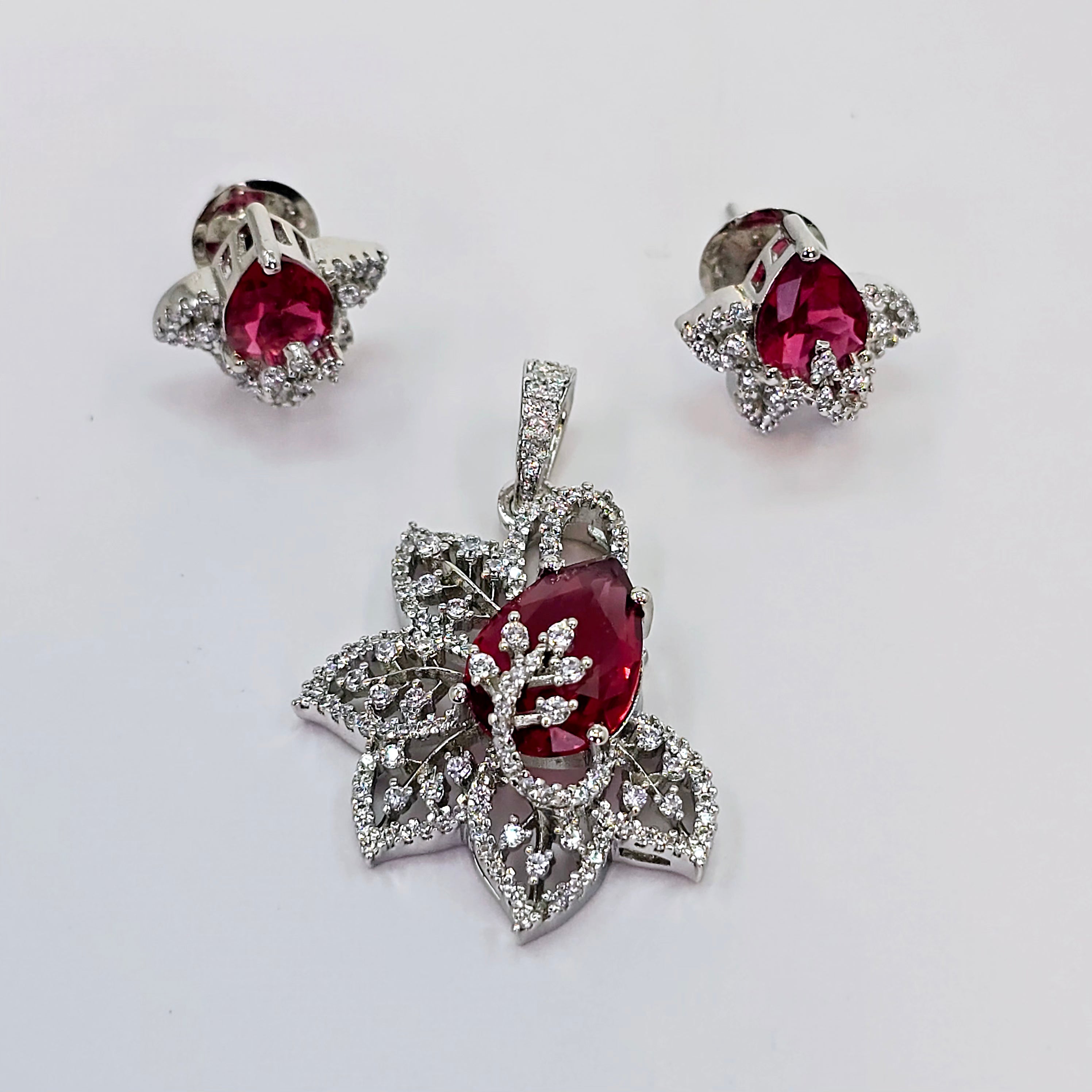 The Damia Whitegold A.D Pendant Earring