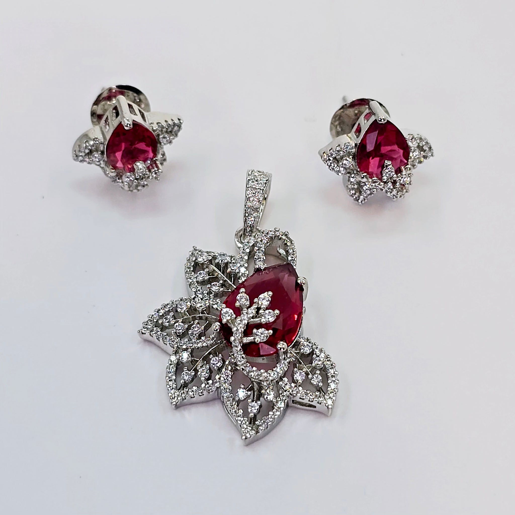 The Damia Whitegold A.D Pendant Earring