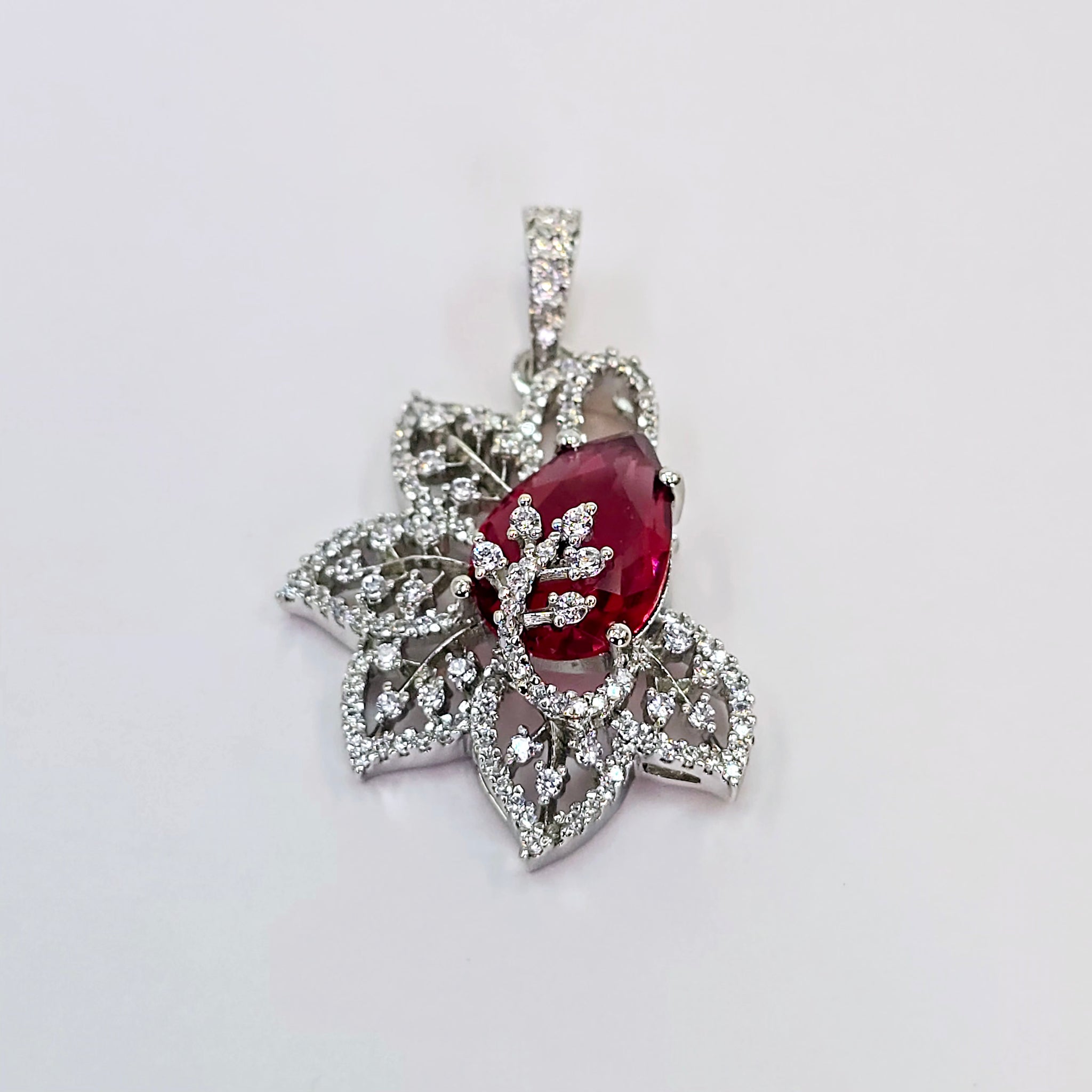 The Damia Whitegold A.D Pendant Earring