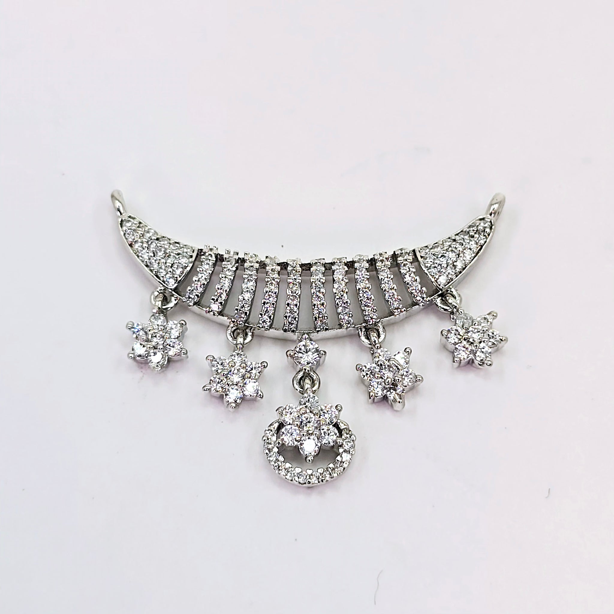 The Dacia Whitegold A.D Pendant Earring (M.S)